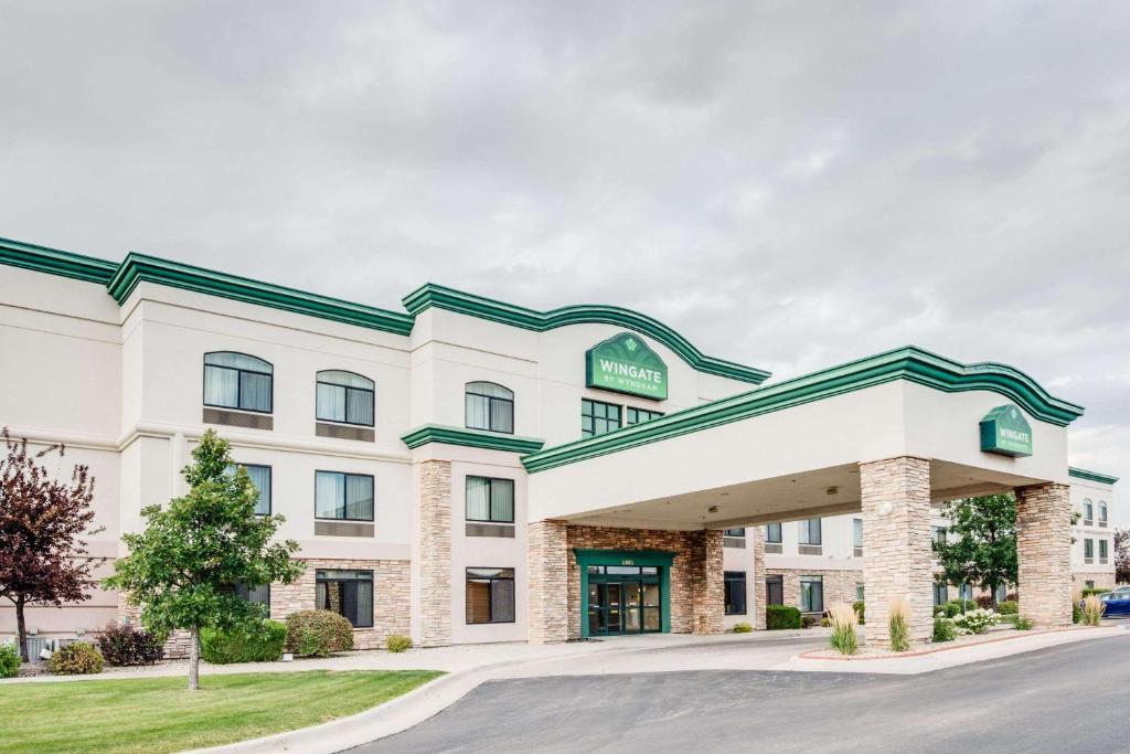 a rendering of the front of a hotel at Wingate by Wyndham Gillette near CAM-PLEX in Gillette