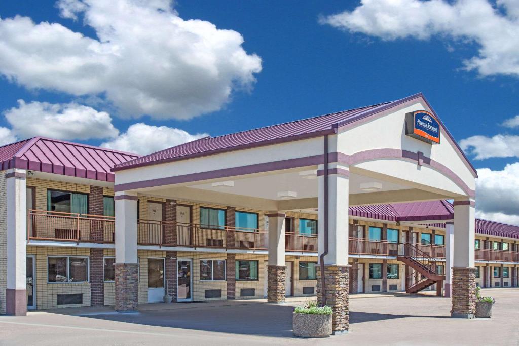 a rendering of a hotel with a building at North Platte Inn and Suites in North Platte