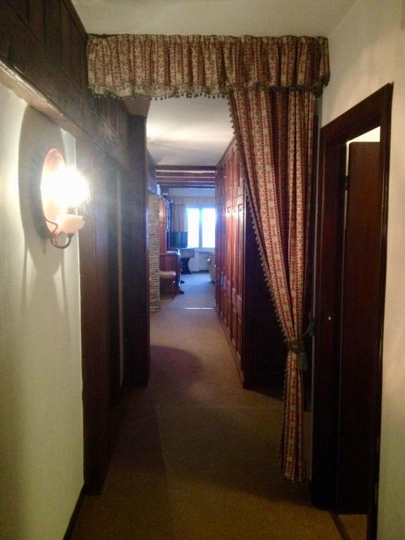 A bed or beds in a room at Alloggio a Sestriere fronte piste