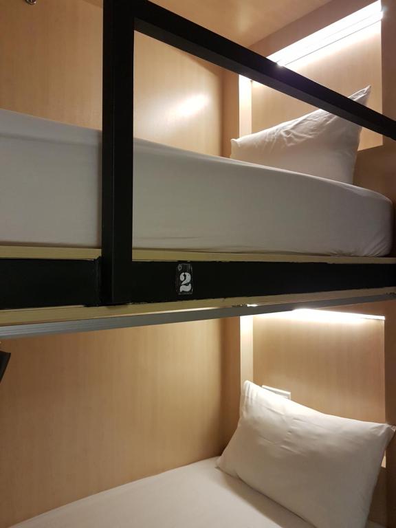 Postel nebo postele na pokoji v ubytování Hotel 1000 Miles