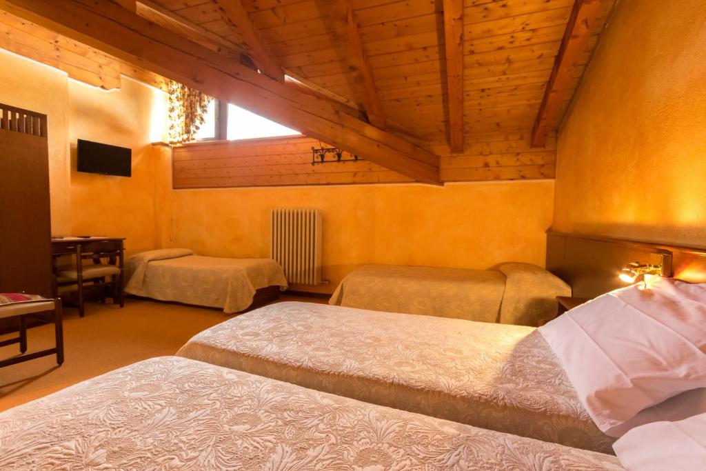Postel nebo postele na pokoji v ubytování Hotel Punta Cian