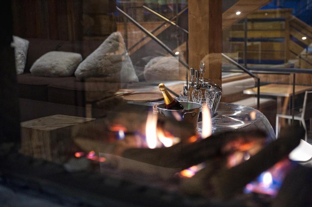 Posezení v ubytování Hôtel-Chalet Les Ecureuils Restaurant, Piscine, Jardin Garage