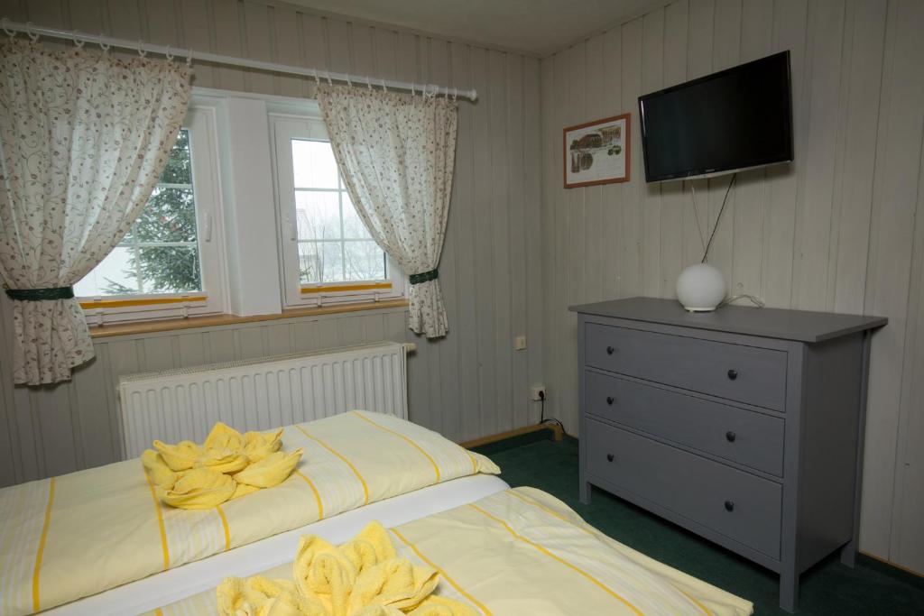 Postel nebo postele na pokoji v ubytování Pension Immergrün