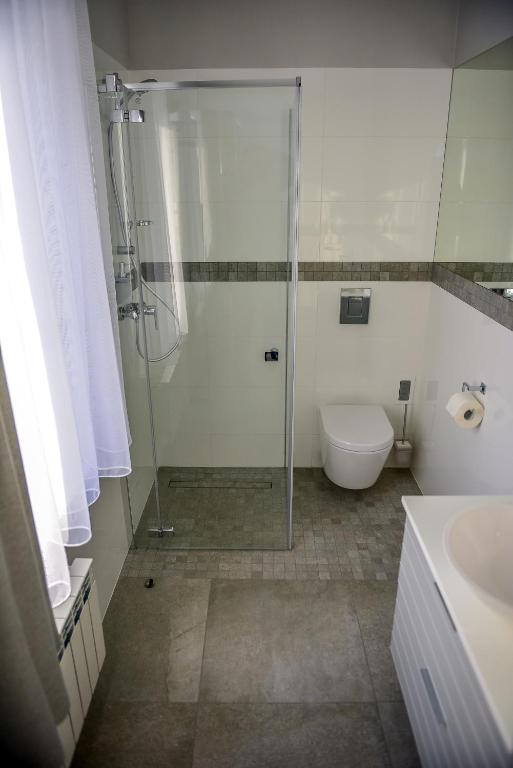Koupelna v ubytování Hotel Coliber