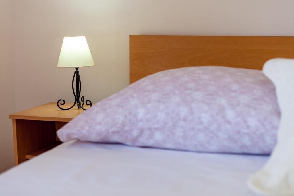 Postel nebo postele na pokoji v ubytování Rooms Marinac