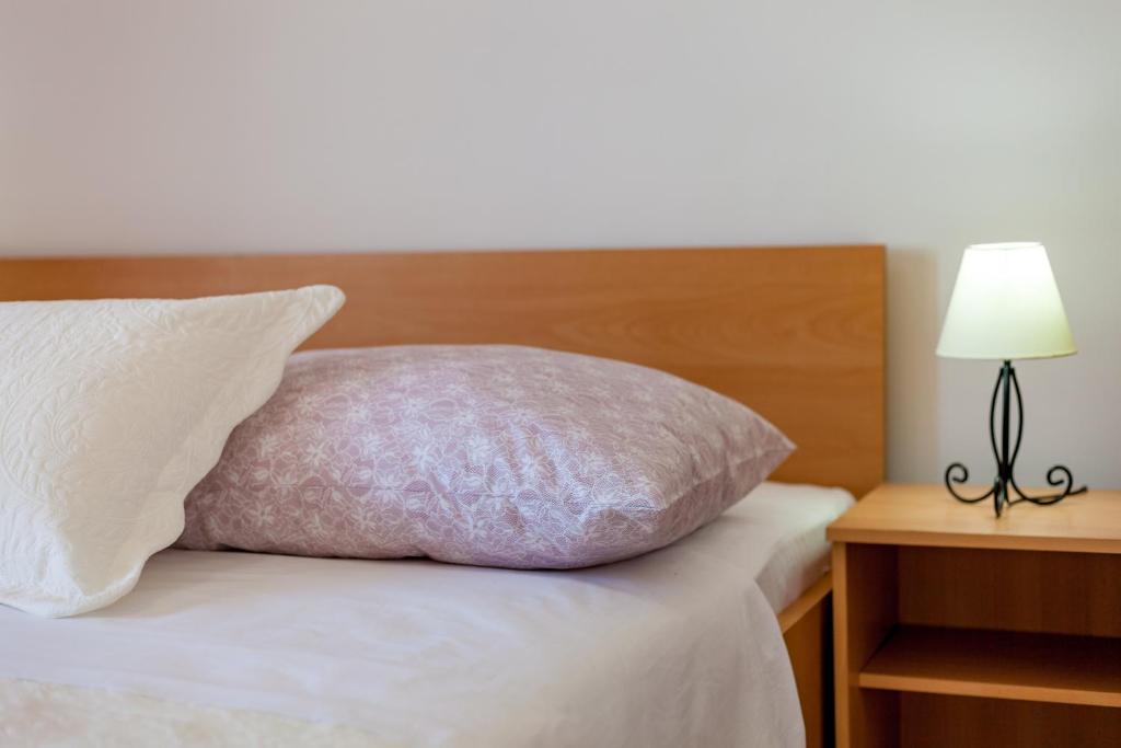 Postel nebo postele na pokoji v ubytování Rooms Marinac