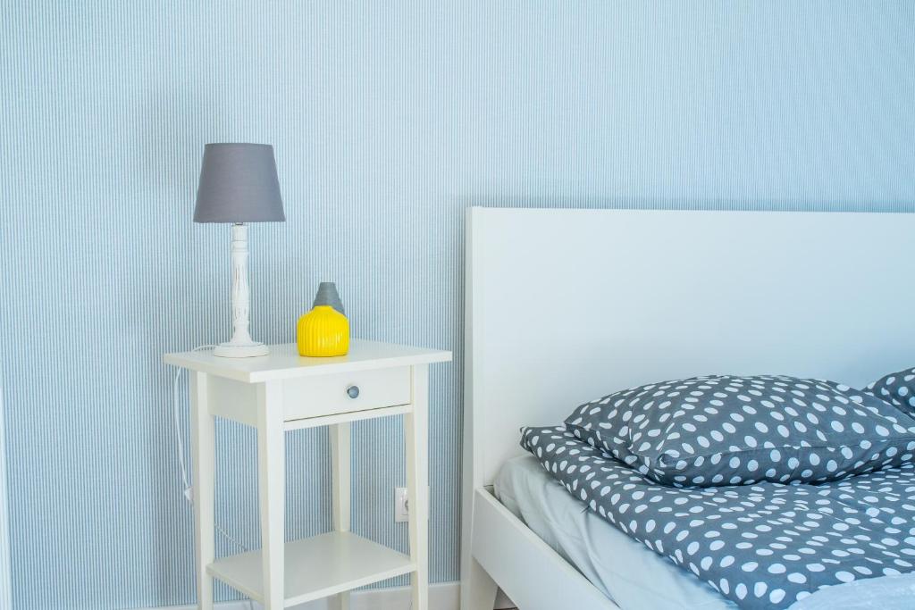 Posteľ alebo postele v izbe v ubytovaní Apartamenty Gubałówka