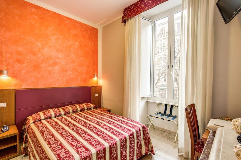 Cama o camas de una habitación en Buonarroti Suite