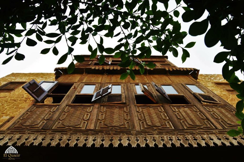 a building with a tower with windows on it at El Quseir Hotel in Quseir