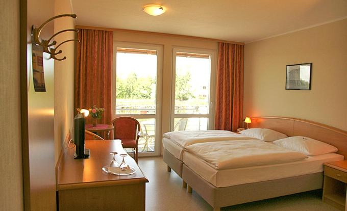 Postel nebo postele na pokoji v ubytování Hotel zur Brücke