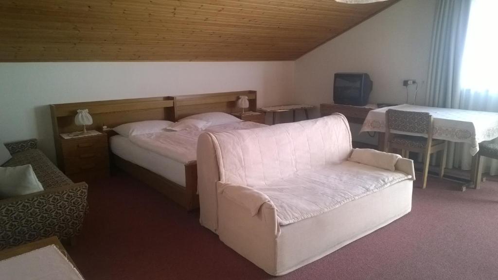 Postel nebo postele na pokoji v ubytování Garni Mühlanger