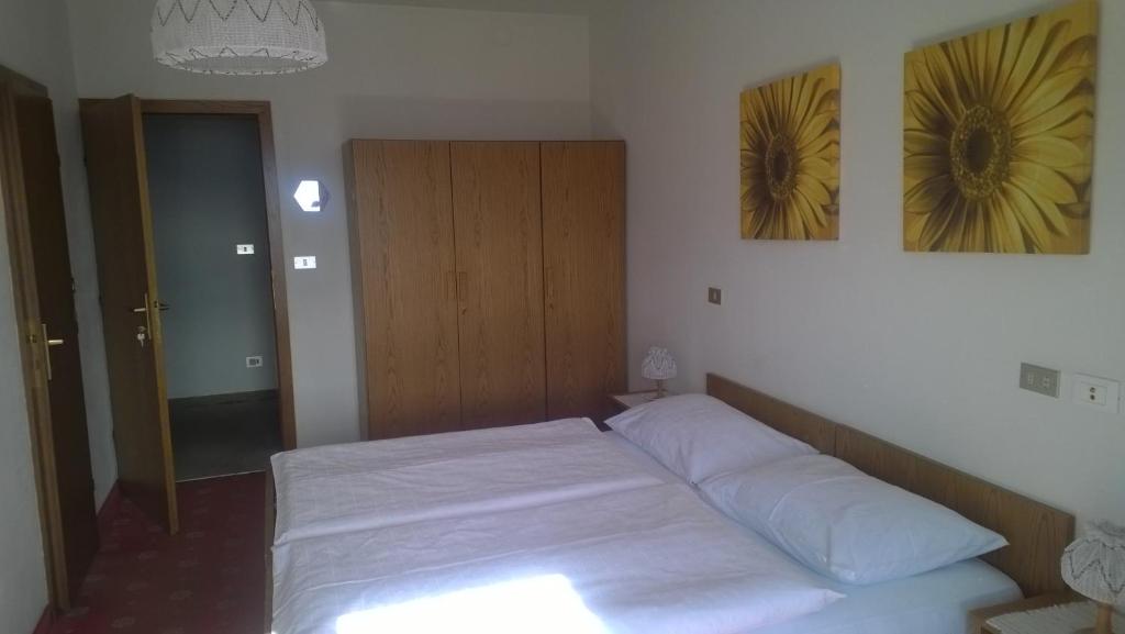 Postel nebo postele na pokoji v ubytování Garni Mühlanger