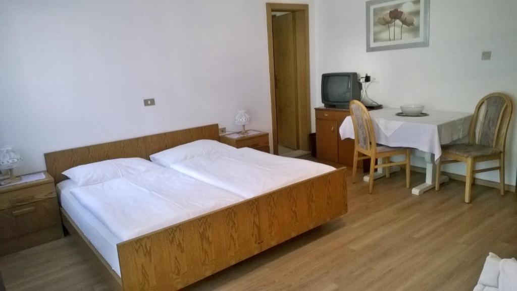 Postel nebo postele na pokoji v ubytování Garni Mühlanger