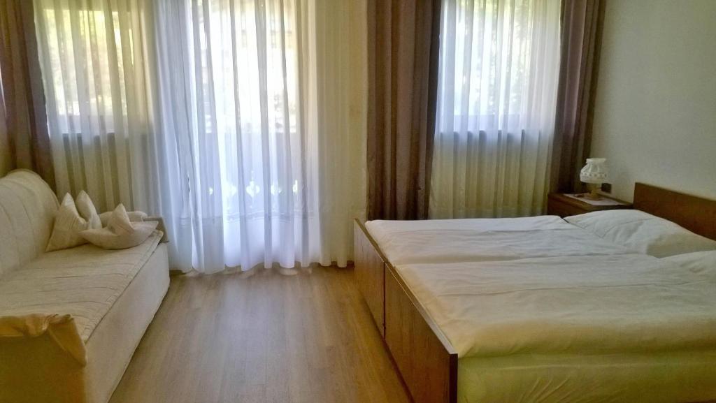 Postel nebo postele na pokoji v ubytování Garni Mühlanger