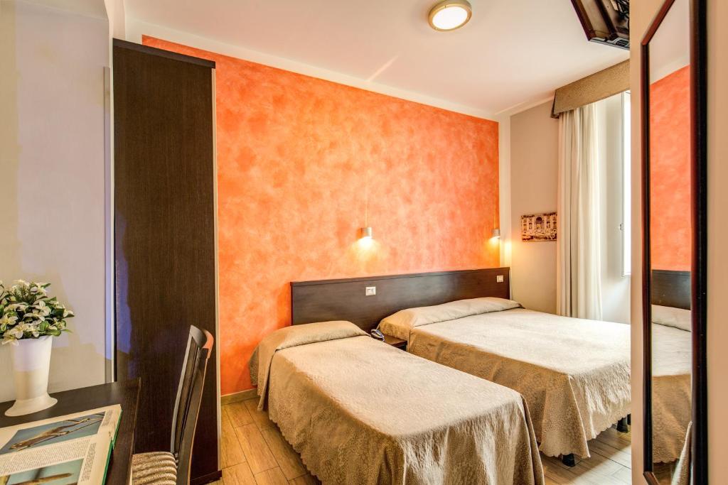 Cama o camas de una habitación en Buonarroti Suite
