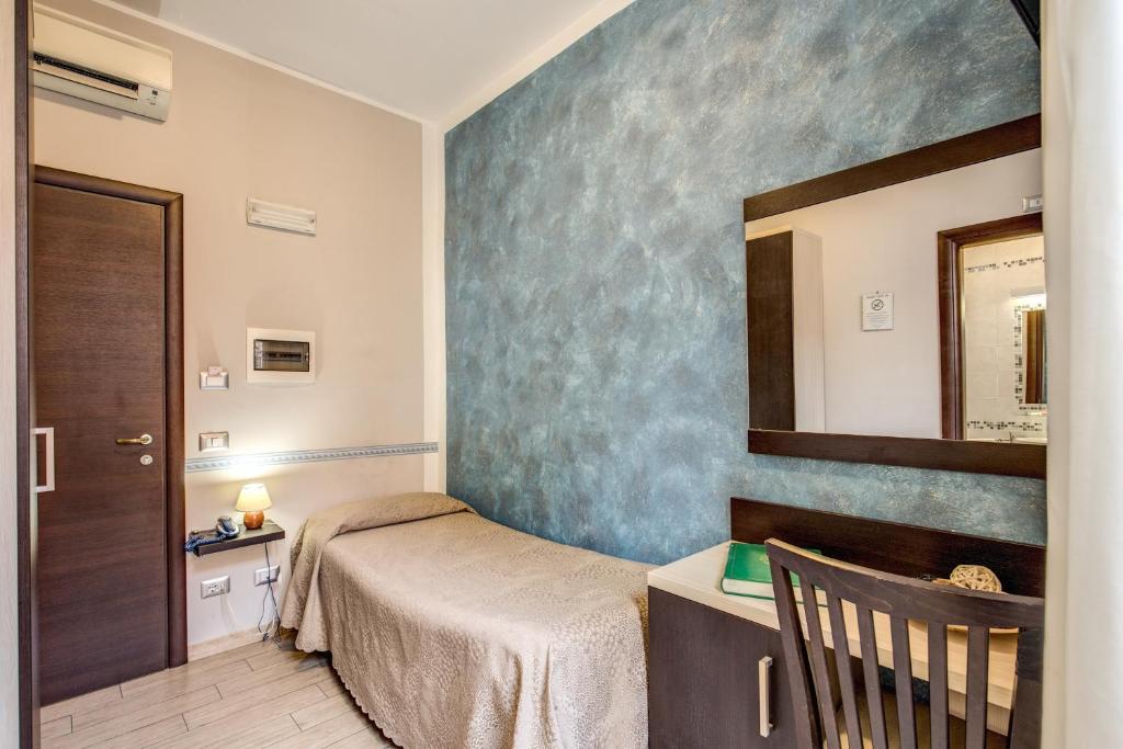 Cama o camas de una habitación en Buonarroti Suite