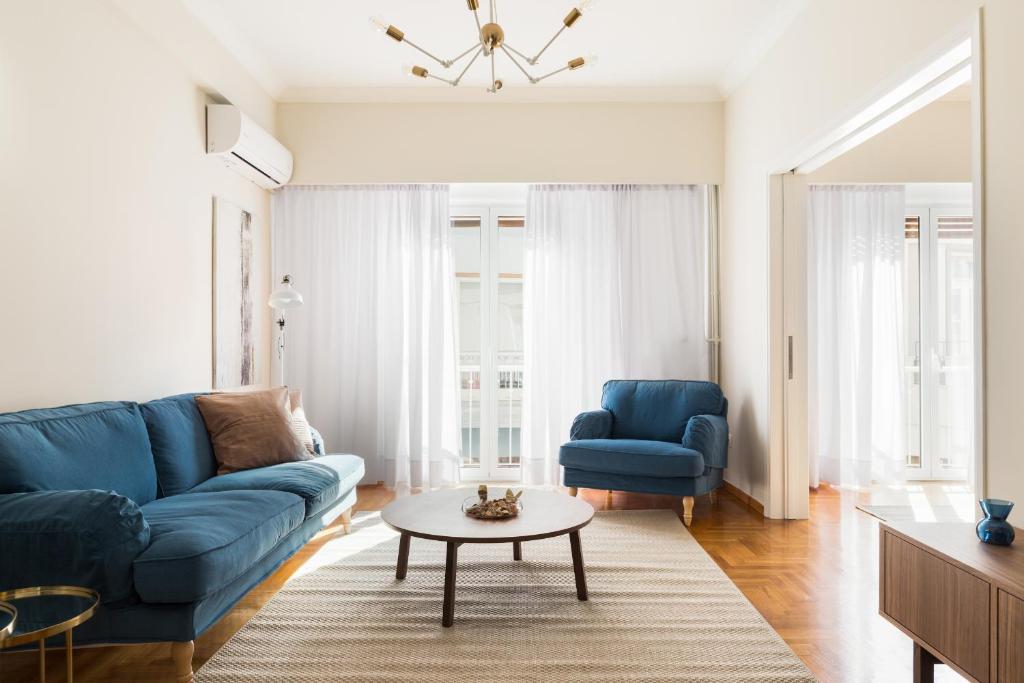 A seating area at Chic Flat in the Heart of Athens by UPSTREET