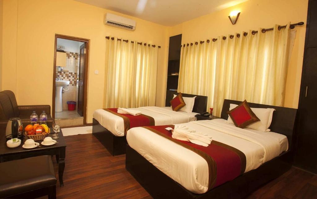 Postel nebo postele na pokoji v ubytování Hotel Dream City