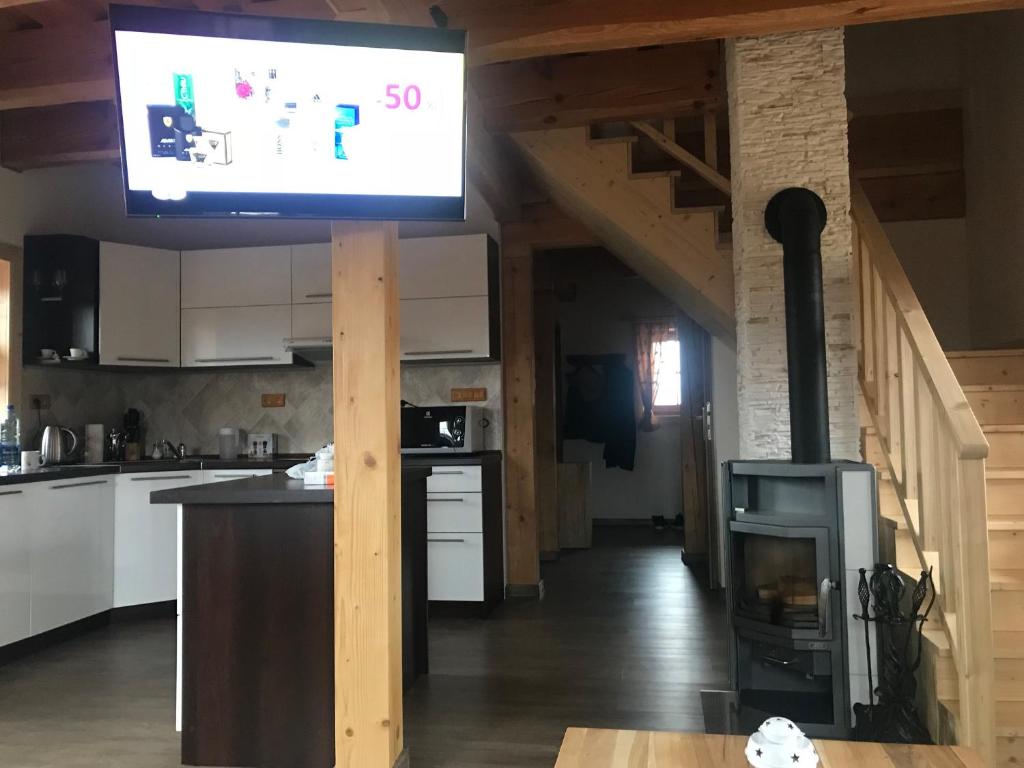 Kuchyň nebo kuchyňský kout v ubytování Chata Eden