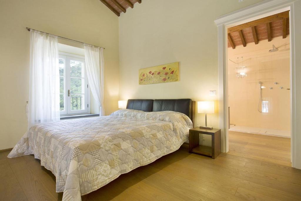 Posteľ alebo postele v izbe v ubytovaní Santo Stefano 10 by Salogi Villas
