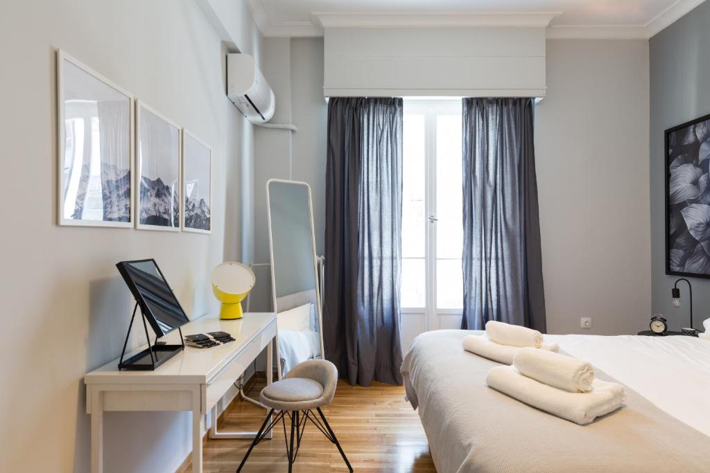 Posteľ alebo postele v izbe v ubytovaní Acropolis Heart 1BD Apartment in Plaka by UPSTREET