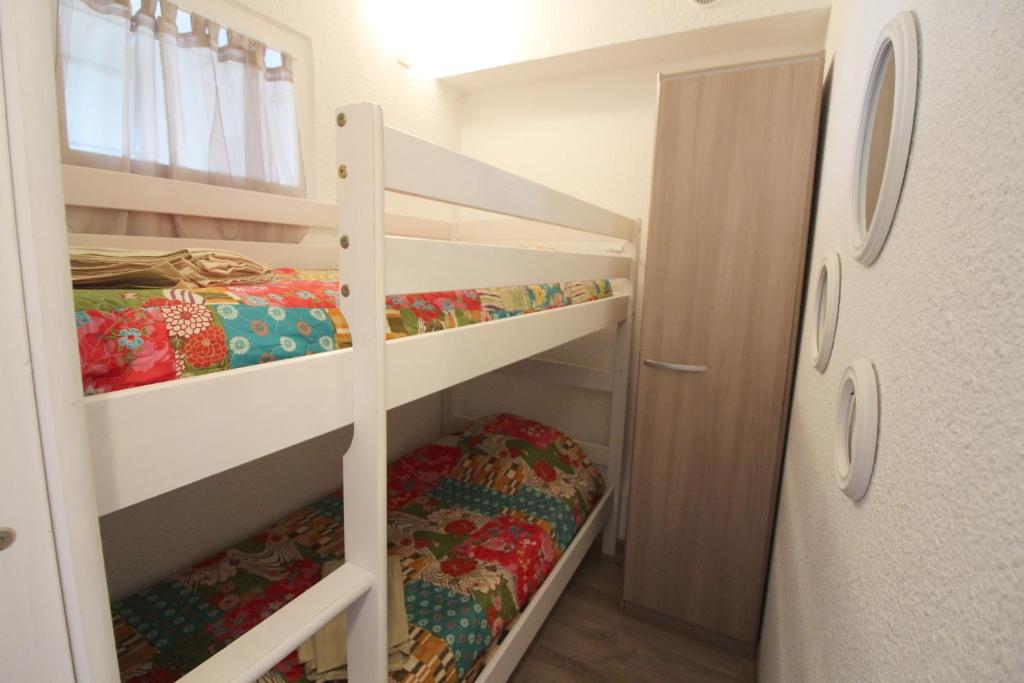 Postel nebo postele na pokoji v ubytování Studio Olympe