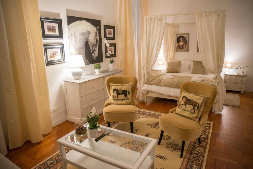 A bed or beds in a room at St Paul House Boutique & Apartment