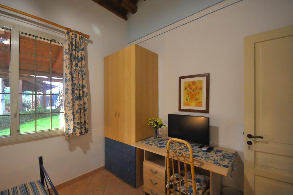 TV a/nebo společenská místnost v ubytování B&B Il Mandorleto Avola