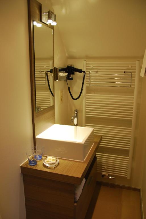 Koupelna v ubytování Hotel Rubens