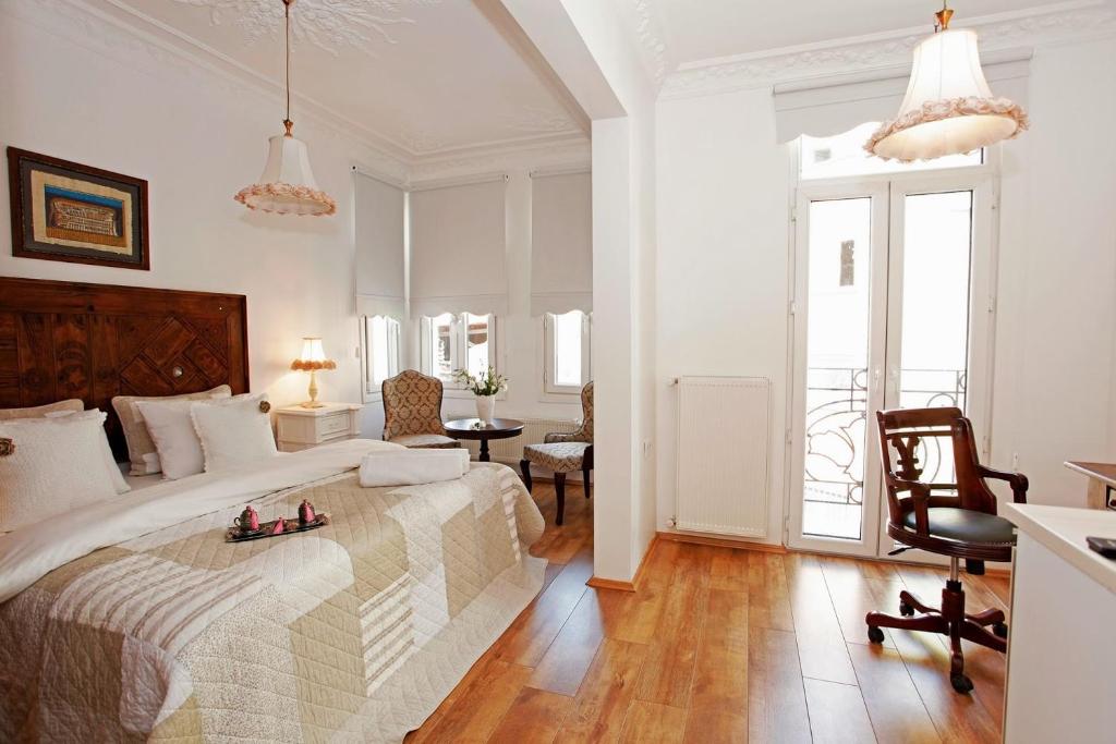Postel nebo postele na pokoji v ubytování The White Swan Suites Beyoglu
