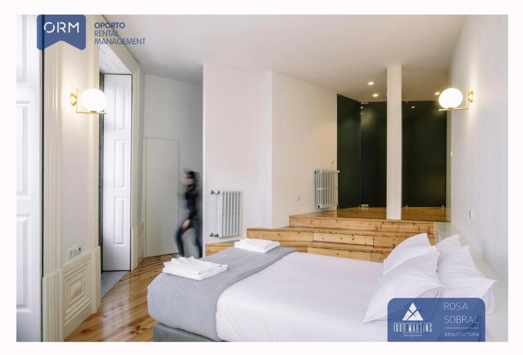 Tempat tidur dalam kamar di ORM - Bainharia Apartment