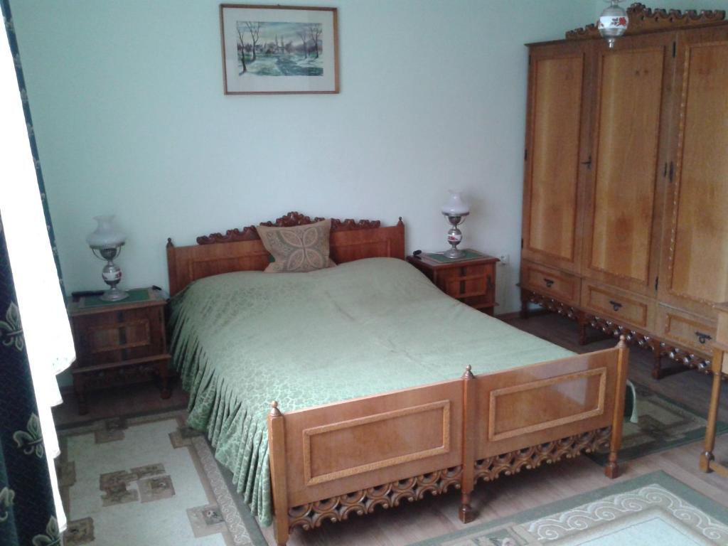 Postel nebo postele na pokoji v ubytování Csaki Vendeghaz