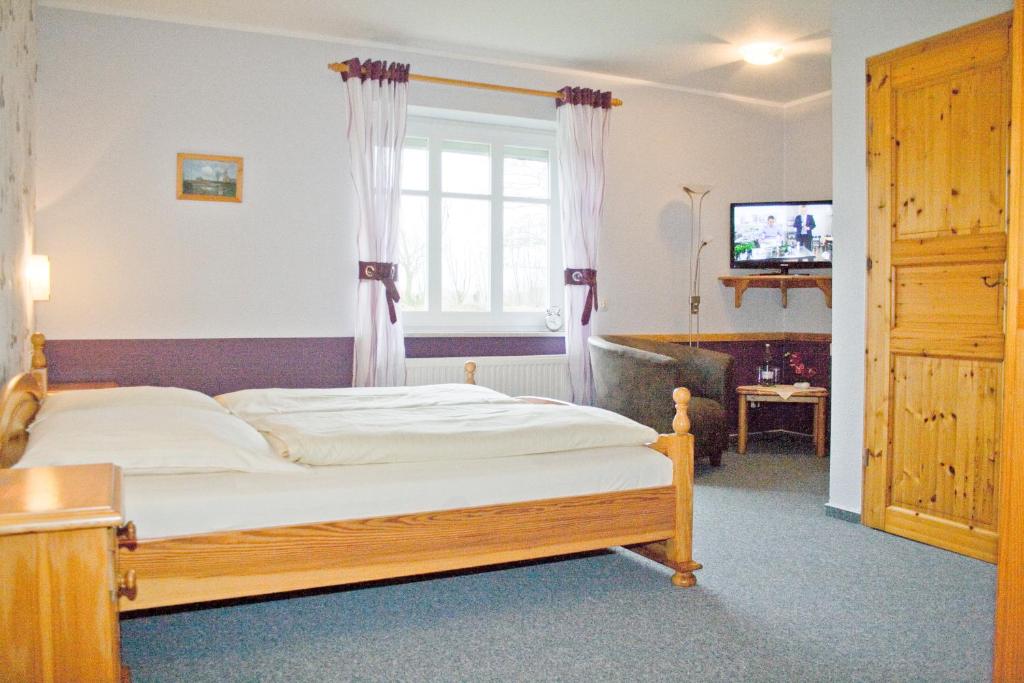 Postel nebo postele na pokoji v ubytování Landgasthof Fegetasch