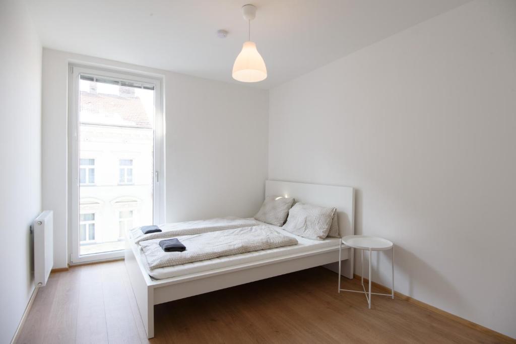 Posteľ alebo postele v izbe v ubytovaní Vienna City Apartments 1100 Vienna