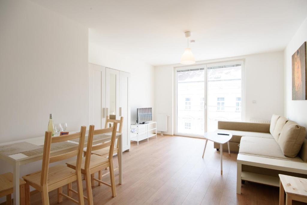 Televízia a/alebo spoločenská miestnosť v ubytovaní Vienna City Apartments 1100 Vienna