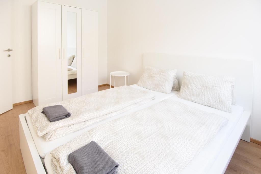 Posteľ alebo postele v izbe v ubytovaní Vienna City Apartments 1100 Vienna