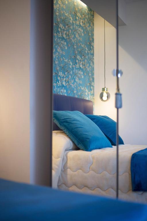 Ένα ή περισσότερα κρεβάτια σε δωμάτιο στο B & B La Terrazza sul mare