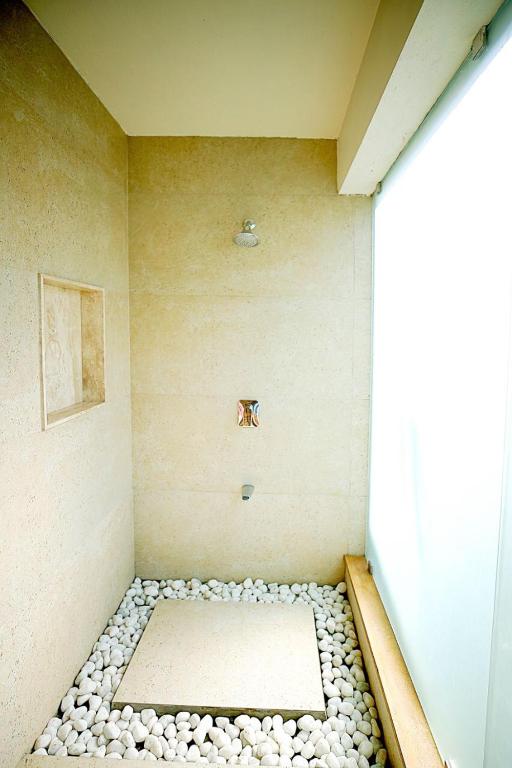 Koupelna v ubytování Frangipani Villa