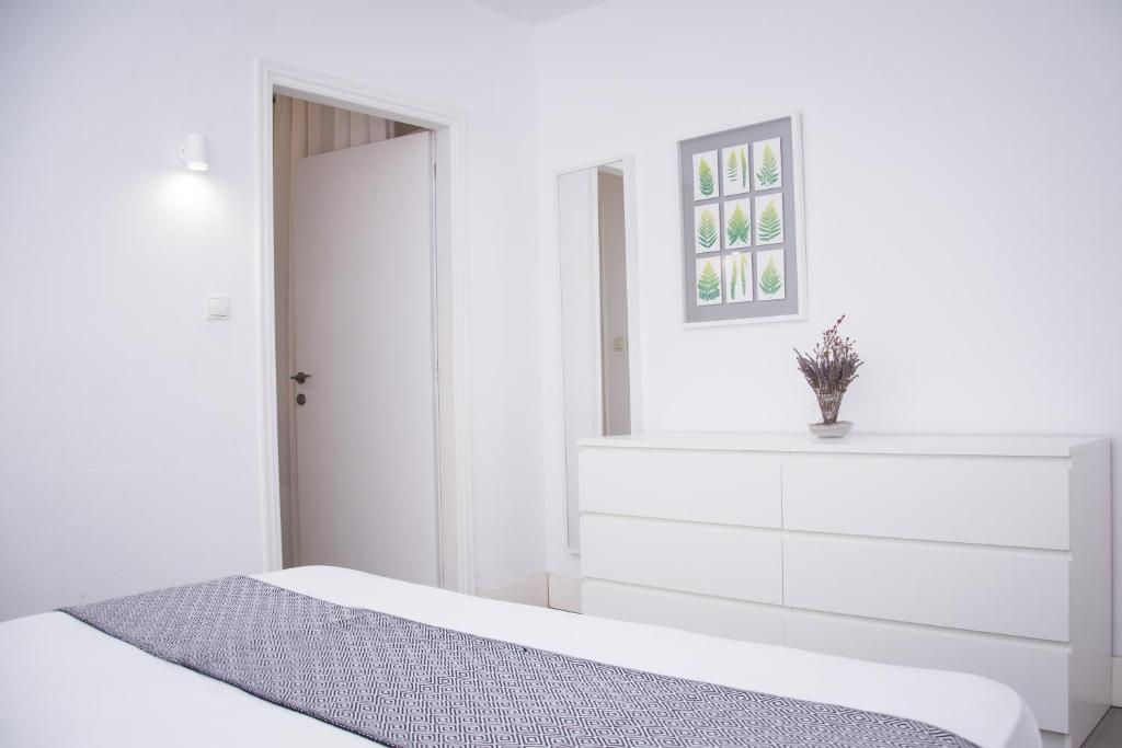 Postel nebo postele na pokoji v ubytování Avgerou Studios and Apartments
