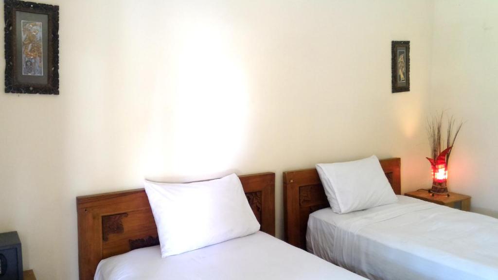 Postel nebo postele na pokoji v ubytování Astawa House
