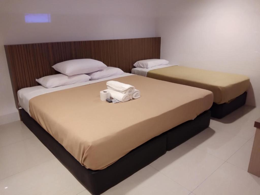 Postel nebo postele na pokoji v ubytování Comfort Two Hotel