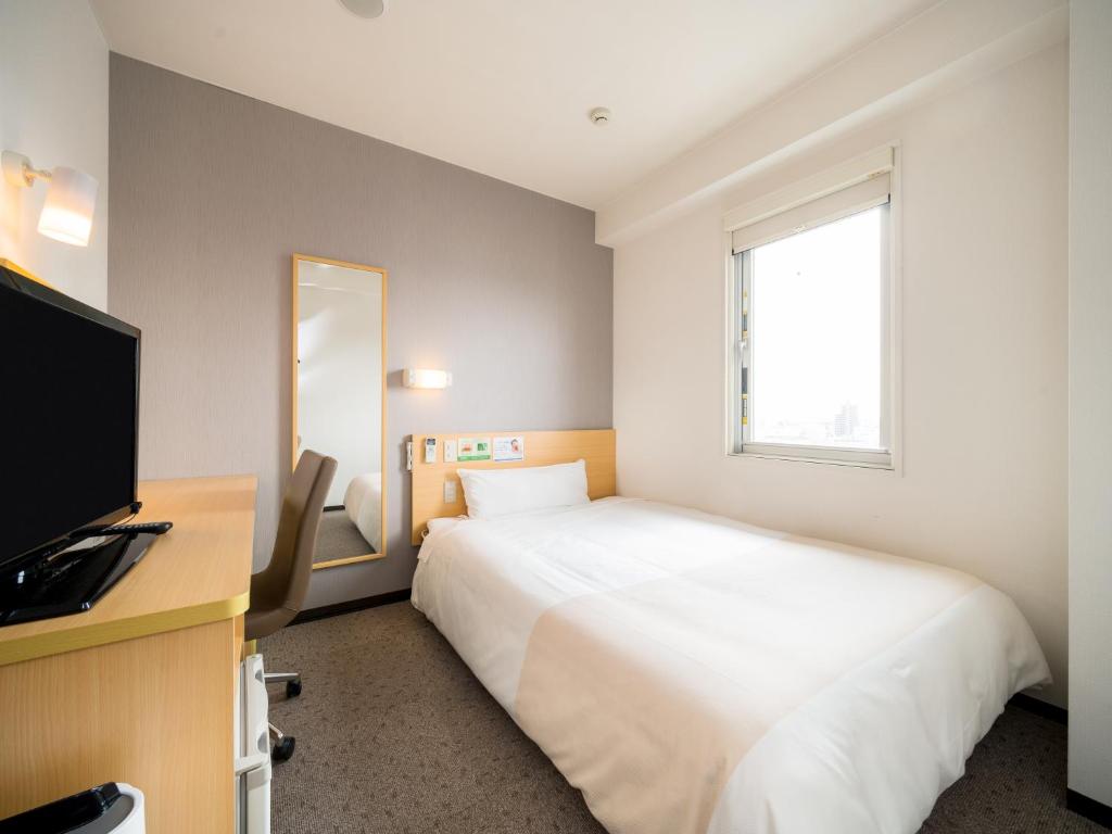 TV a/nebo společenská místnost v ubytování Super Hotel Yokkaichi Route 1