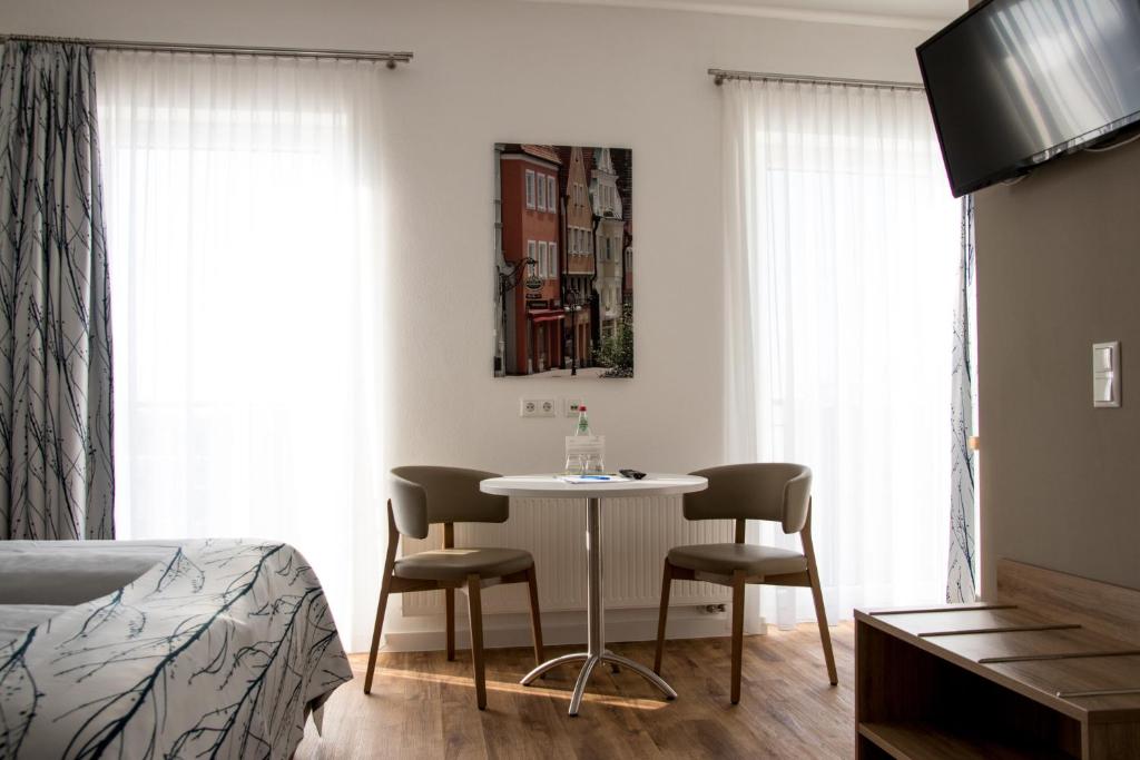 Postel nebo postele na pokoji v ubytování Pension Engelkeller