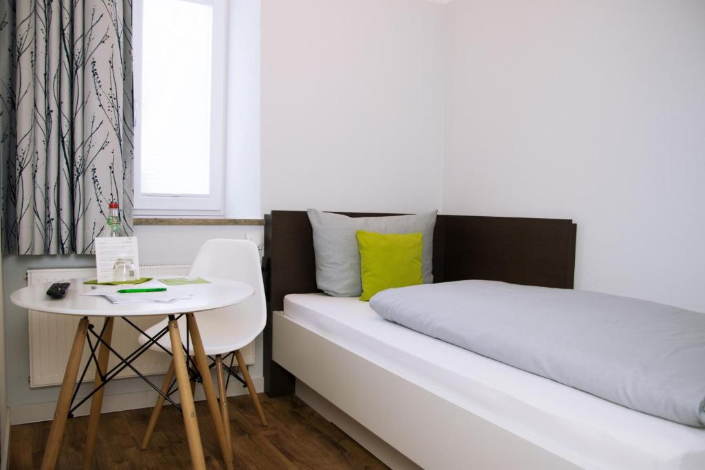 Postel nebo postele na pokoji v ubytování Pension Engelkeller