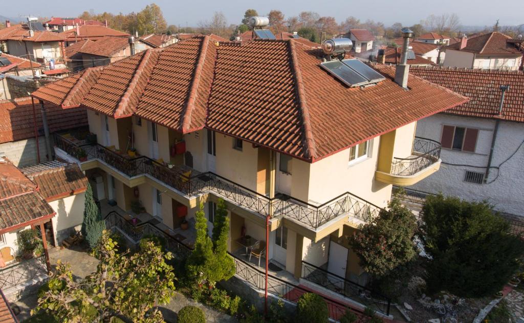 an overhead view of a building with red tile roofs at Agapi in Orma