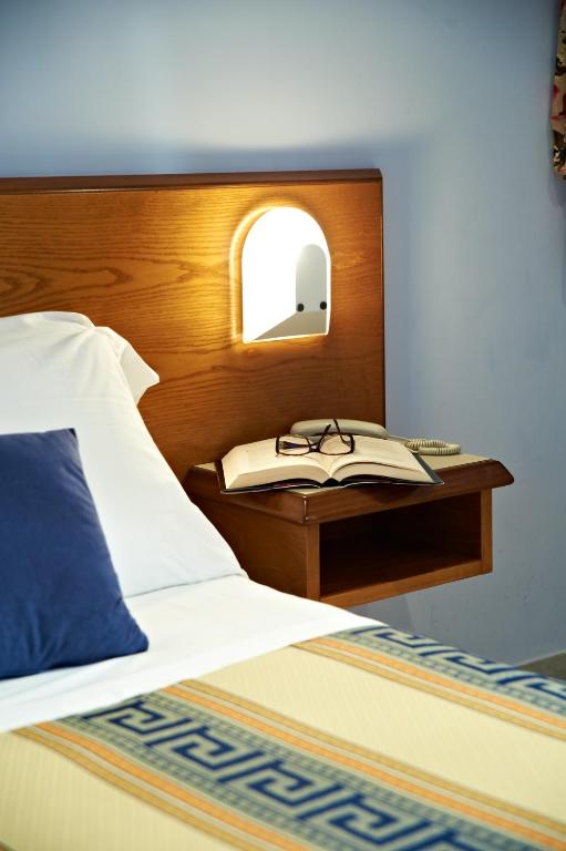 Postel nebo postele na pokoji v ubytování Hotel Sirio