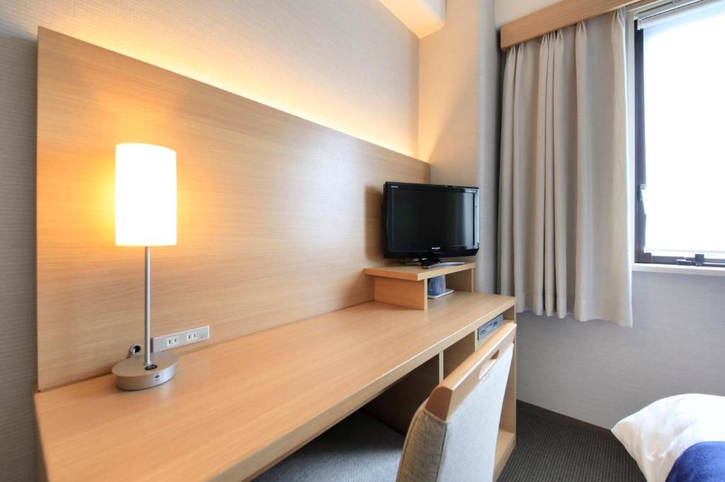 TV a/nebo společenská místnost v ubytování Shonandai Daiichi Hotel Fujisawa Yokohama