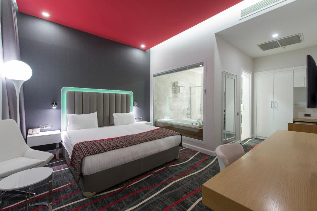 Postel nebo postele na pokoji v ubytování Park Inn by Radisson Ankara Cankaya