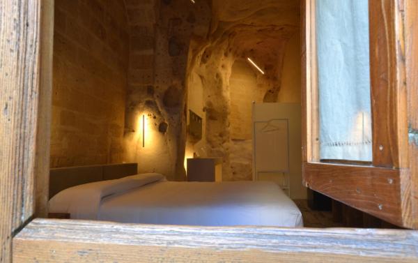 Postel nebo postele na pokoji v ubytování B&B Al Convento