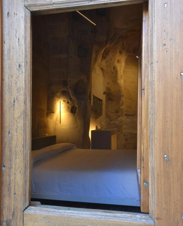 Postel nebo postele na pokoji v ubytování B&B Al Convento